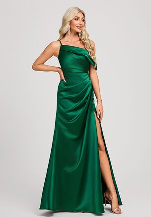 This stunning bridesmaid dress features a sophisticated one shoulder design with soft pleating that creates a flattering draped effect across the bodice. The dress has a chic slit at the front, adding an elegant touch of allure while allowing freedom of movement. The back of the dress is equally stunning with a draped one shoulder look and a smooth, fitted bodice. Made from a luxurious satin, the dress has a soft sheen, offering a smooth and polished finish that catches the light beautifully. Perfect for a formal event, this gown balances timeless elegance with modern charm.