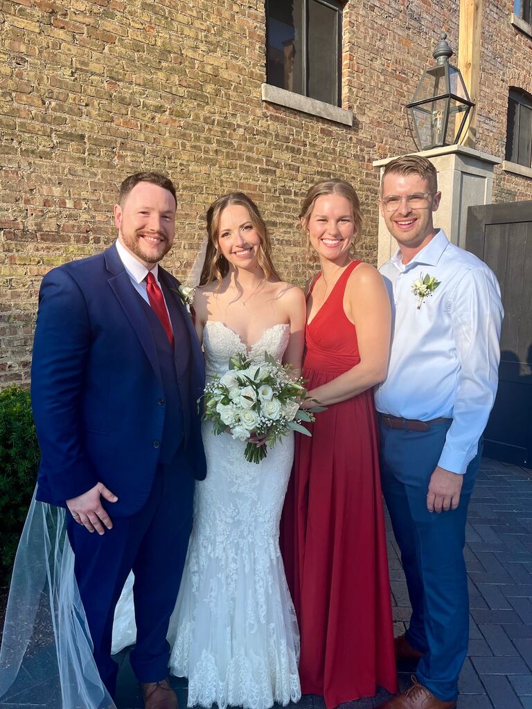 Attending Becky and Luke's wedding! Mike sang in the ceremony and Emma caught the bouquet! 