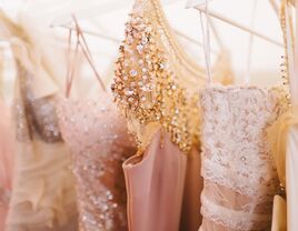 A clothing rack of pretty dresses