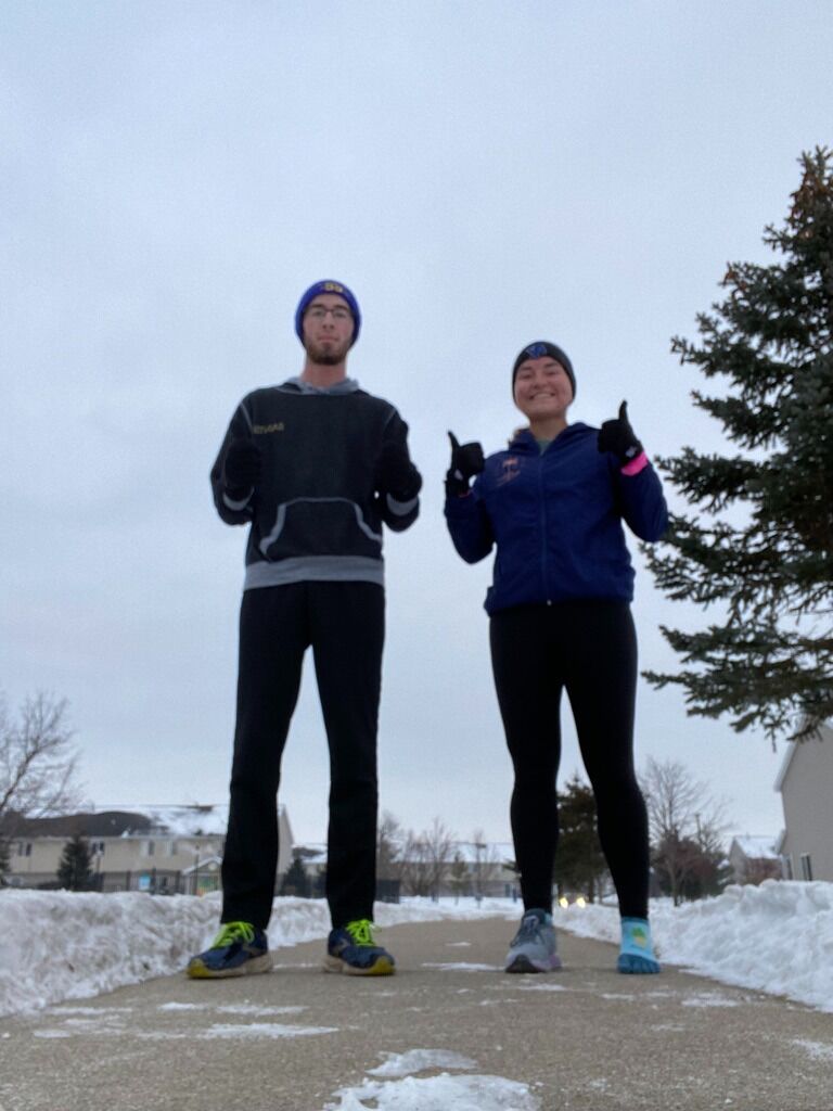 Became friends through Cru at GVSU and started running and playing basketball together.