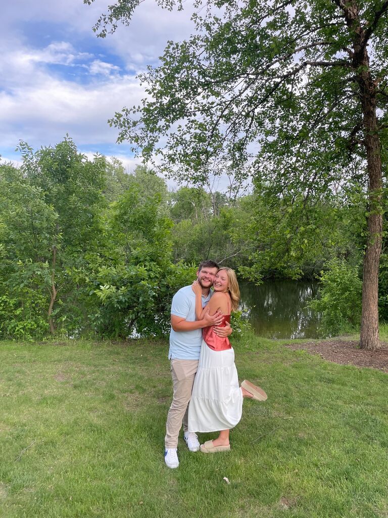 The day Sage and Alex got engaged in a rowboat in Oconomowoc, WI!