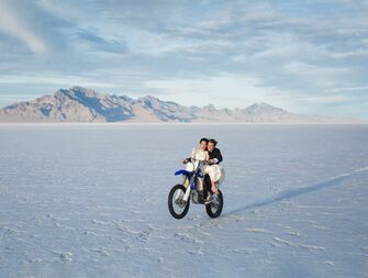 couple on mountain bike at the Utah Salt Flats
