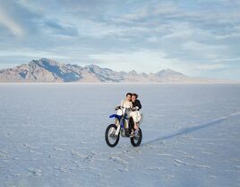 couple on mountain bike at the Utah Salt Flats