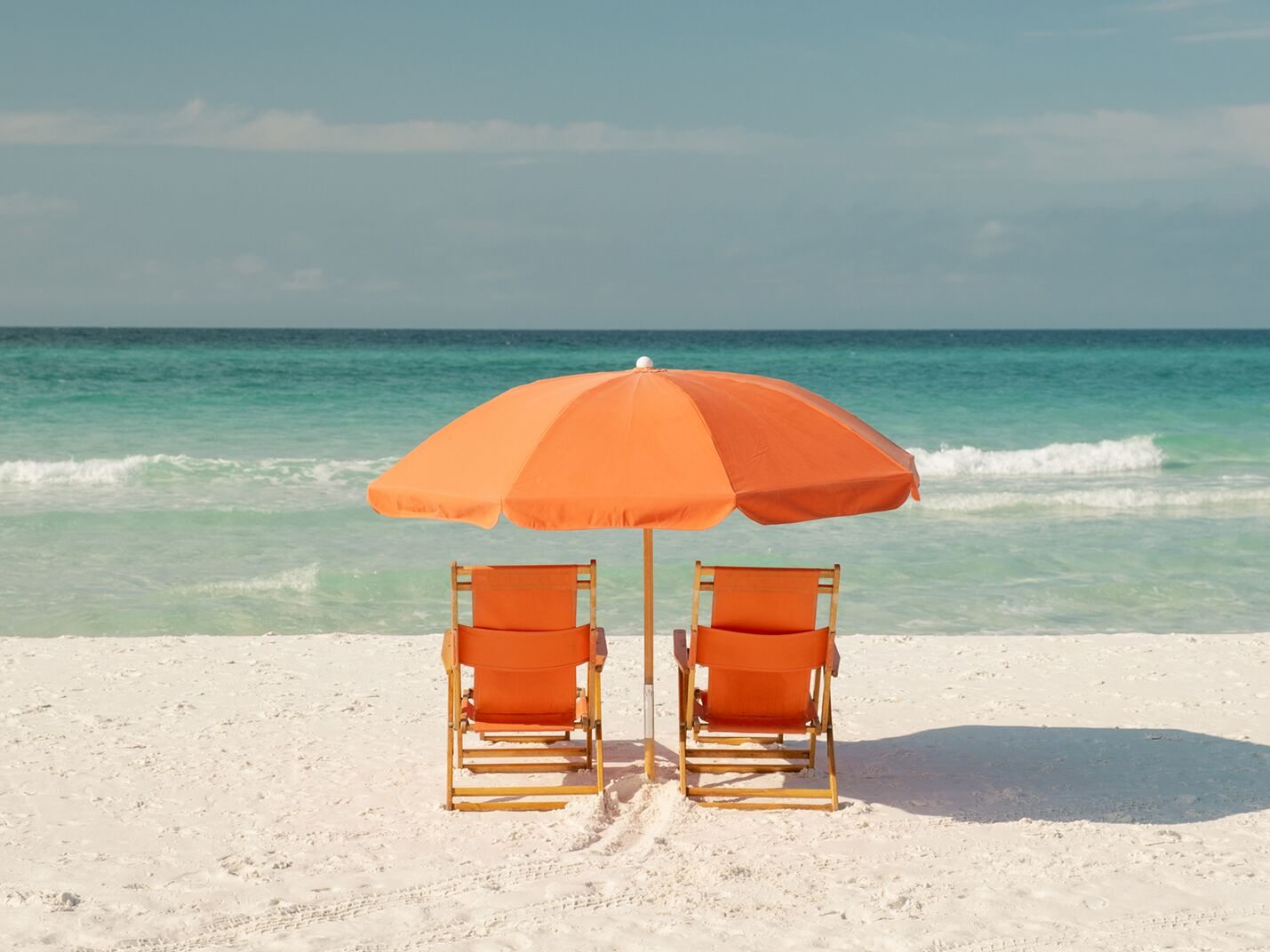 Two deckchairs on beach in Florida