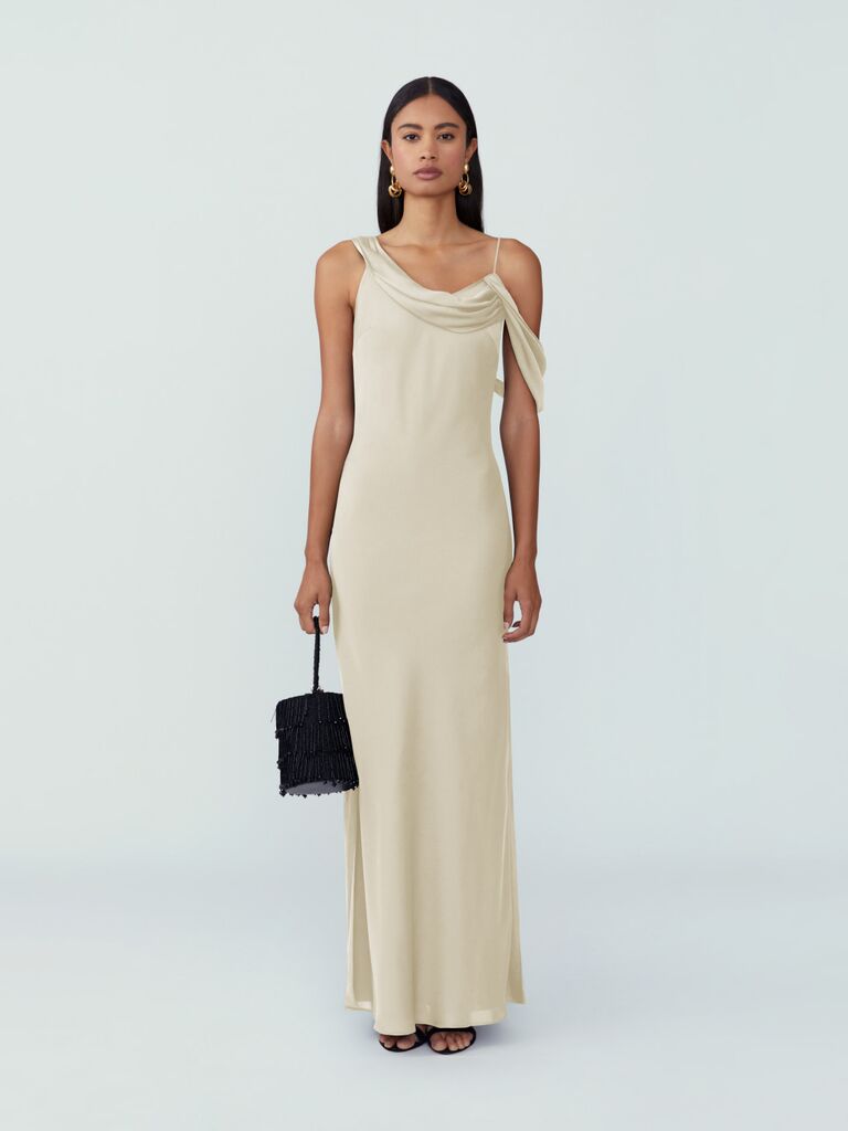 Champagne-colored rehearsal dinner dress with draped open back from Fame and Partners