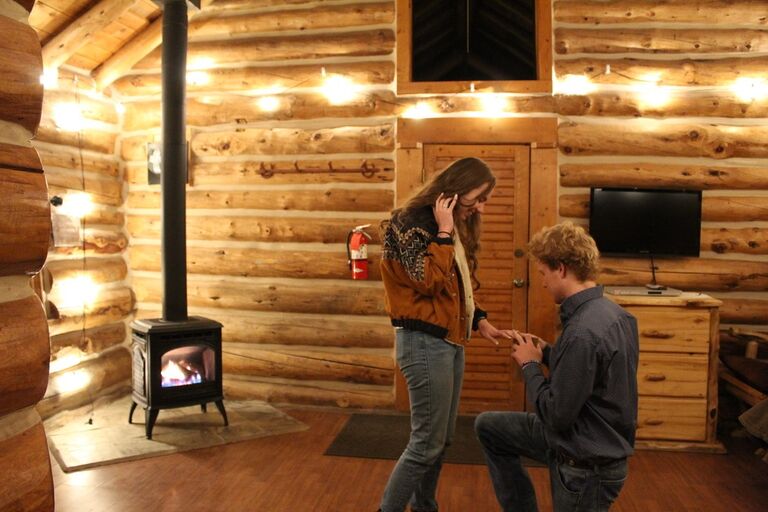 Josh proposed to Emma after a night of dancing. They went up to a cabin in the Snowy Range Mountains to watch a meteor shower. Under the stars and in a cozy cabin he popped the question...and she said yes!