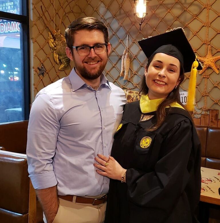 Chad supporting Cali through her Masters program