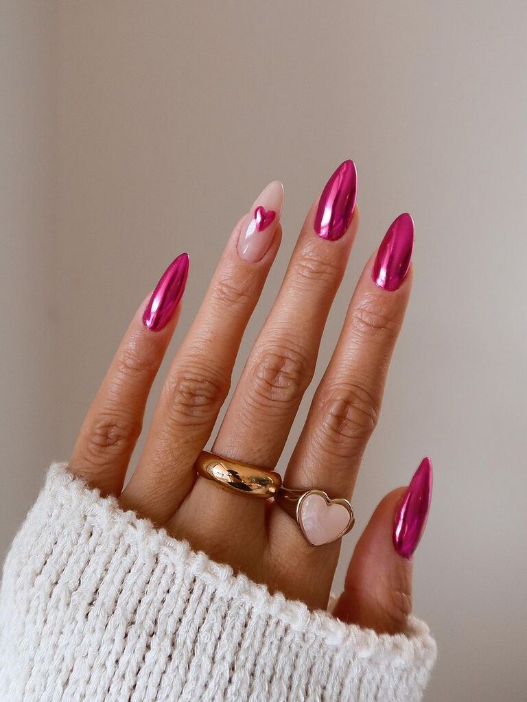Pink chrome Valentine's Day nails with heart design