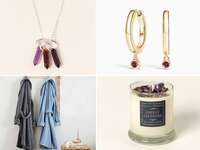 Four 38th anniversary gifts: a pendant necklace, gold hoop earrings, a scented candle, and plush robes