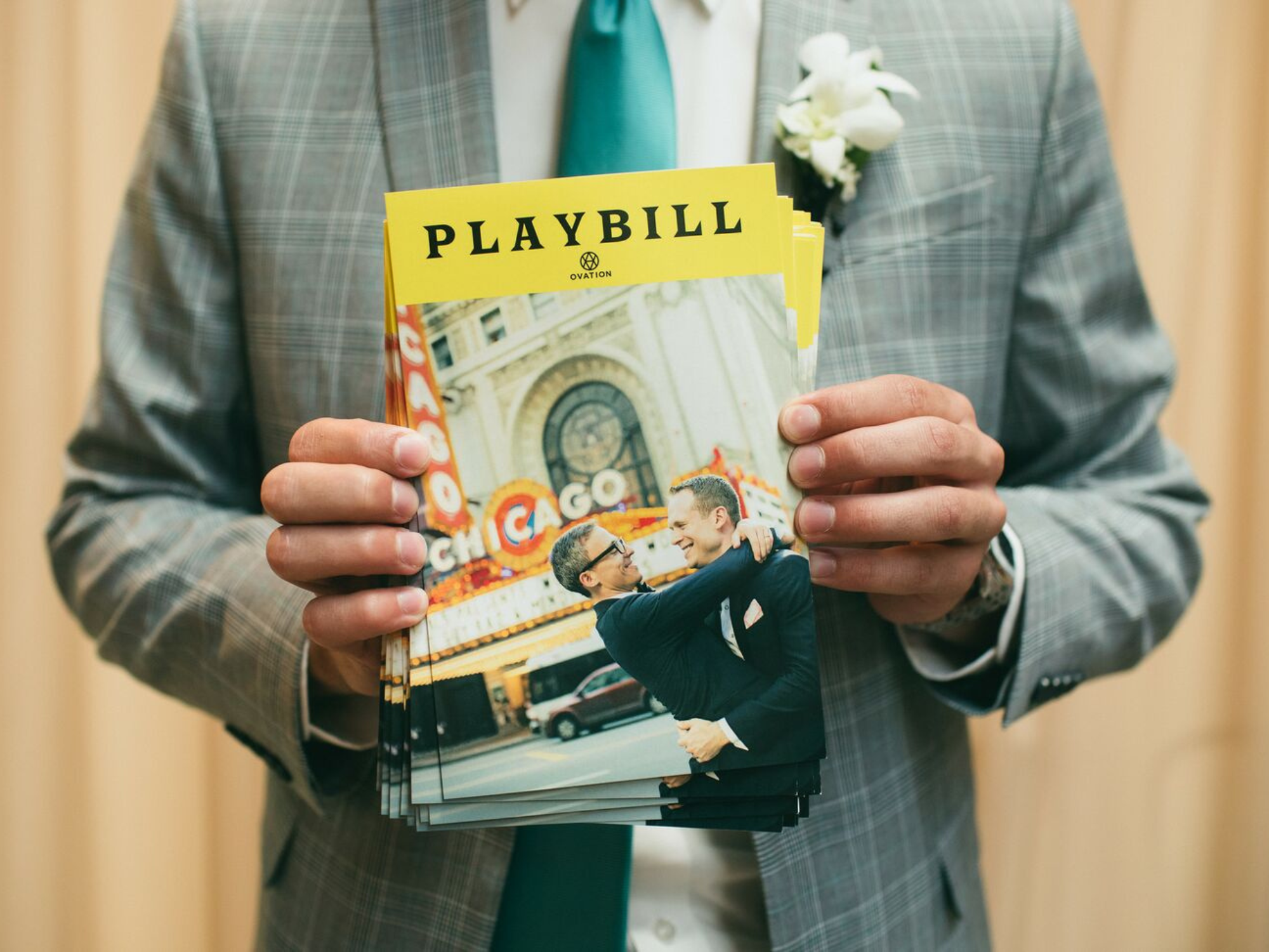 Usher holding wedding playbill 