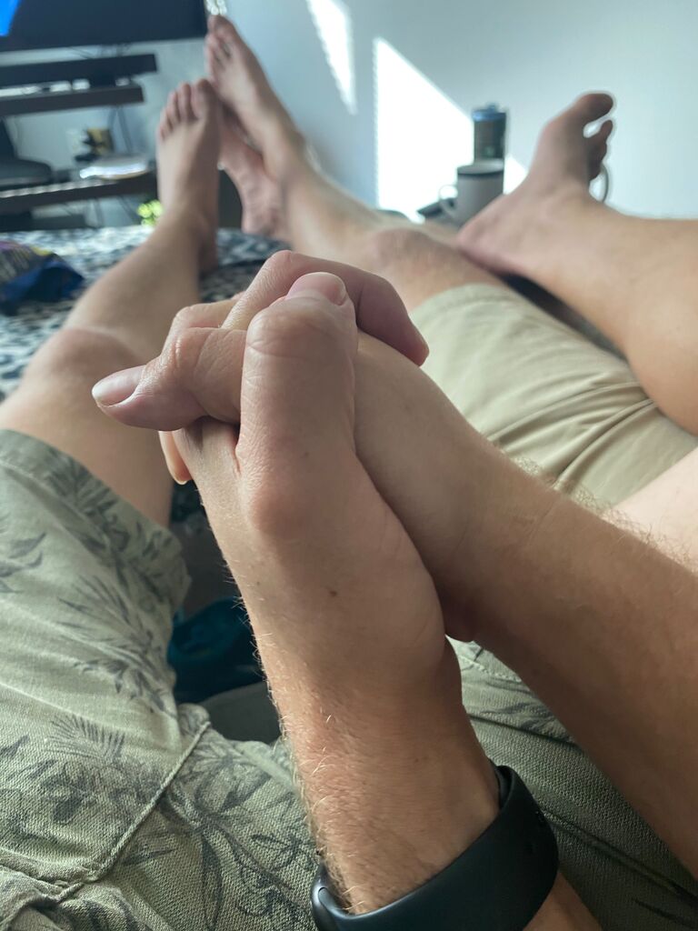 Sitting at home.