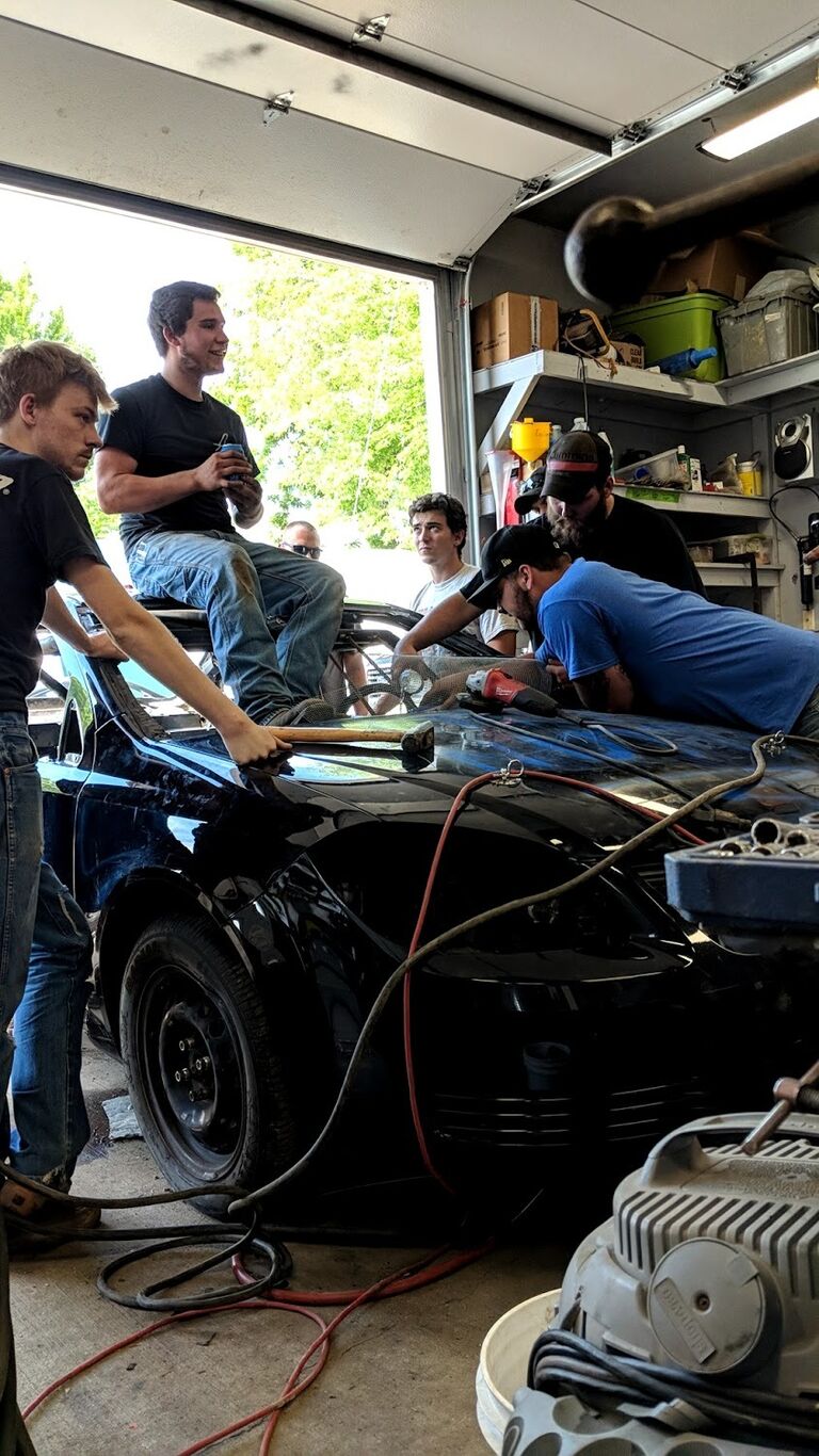 Our friend Race bought a car to turn it into a race car, so all the  guys had to come check it out.