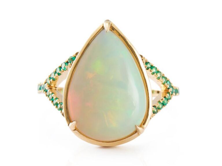Teardrop opal engagement ring with emeralds