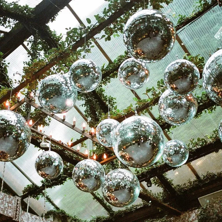 Disco ball chandeliers, taylor swift themed wedding 