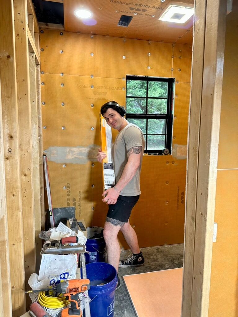 Josh working on the house.