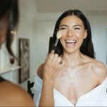 Bride getting makeup done