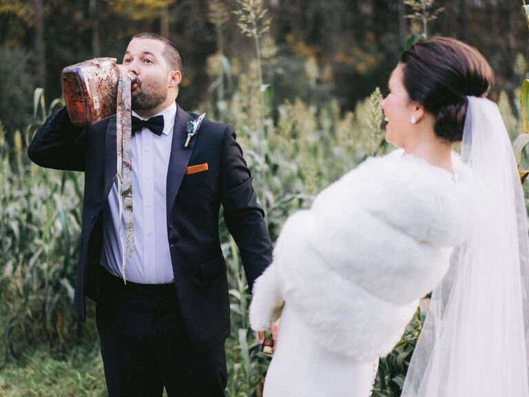 groom drinking bourbon from burying the bourbon ritual
