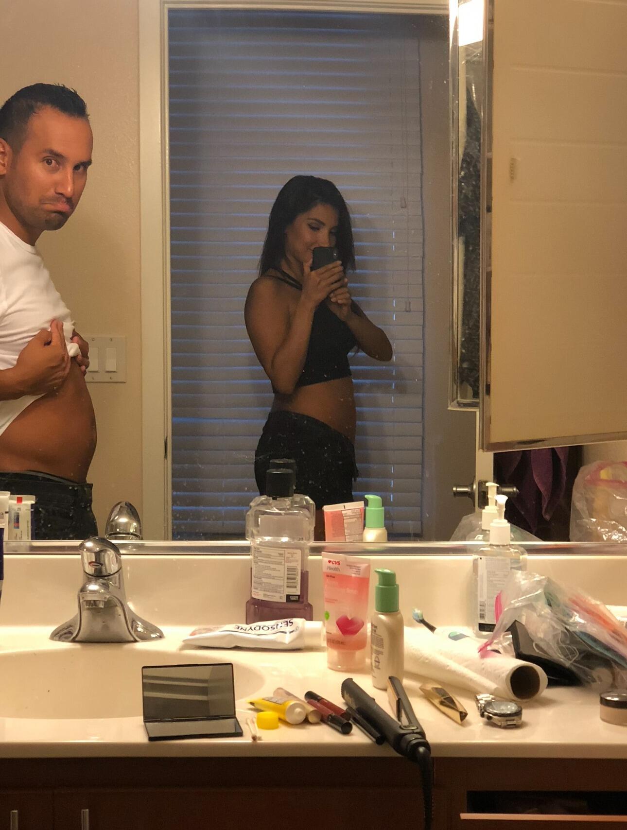After that Mexico trip and after the huge surprise of finding out that we were expecting, we attended our daughter Romi's first concert—in utero—at the Rosebowl to see Beyonce & Jay-Z's On The Run tour.  This is a photo of us getting ready. 😆

Pasadena, Ca 