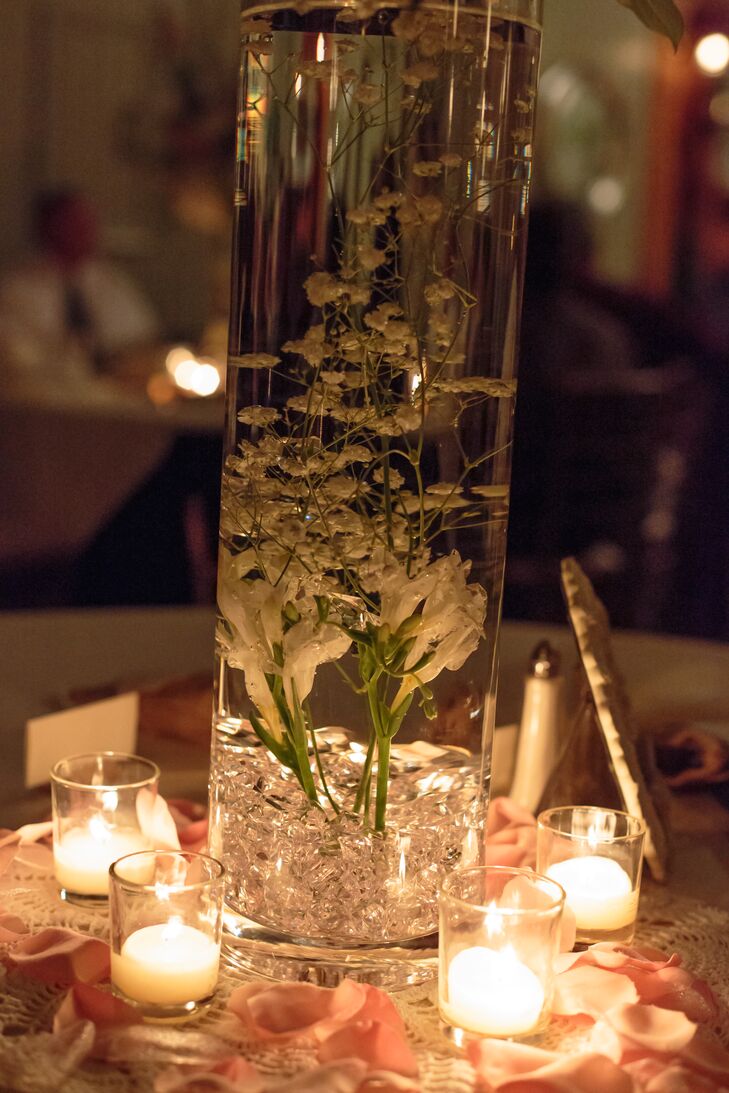 Tall Glass Vase Centerpiece With Floral Accents