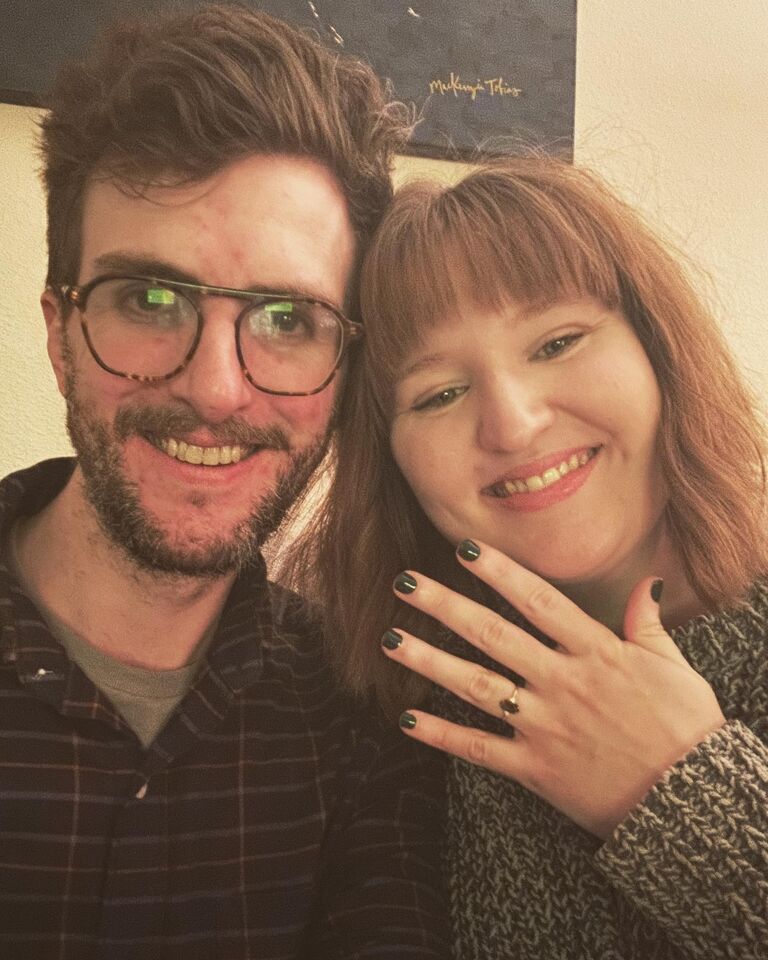 In the midst of a blizzard, snowed in for days, Cole proposes to Caitlin in their living room. 