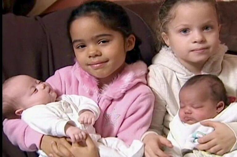 My babies holding my new babys