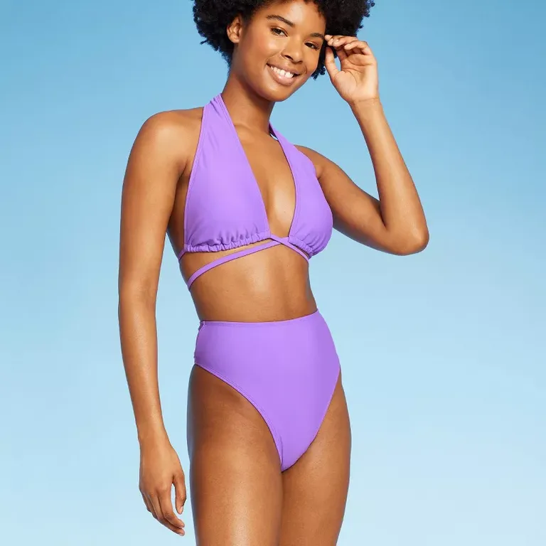 purple bikini with high waisted bottoms and criss cross top
