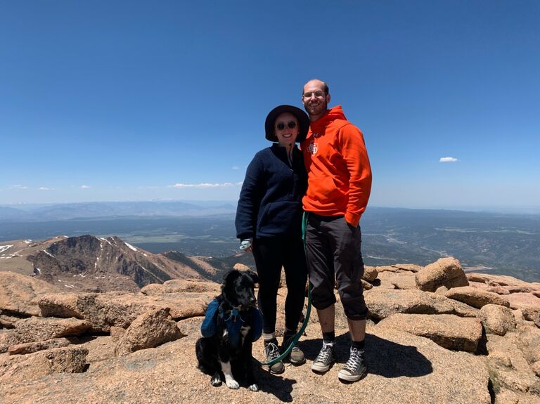 We became "peak" Coloradans by hiking up to Pike's Peak with our dog (and chugging a craft beer at the top) 