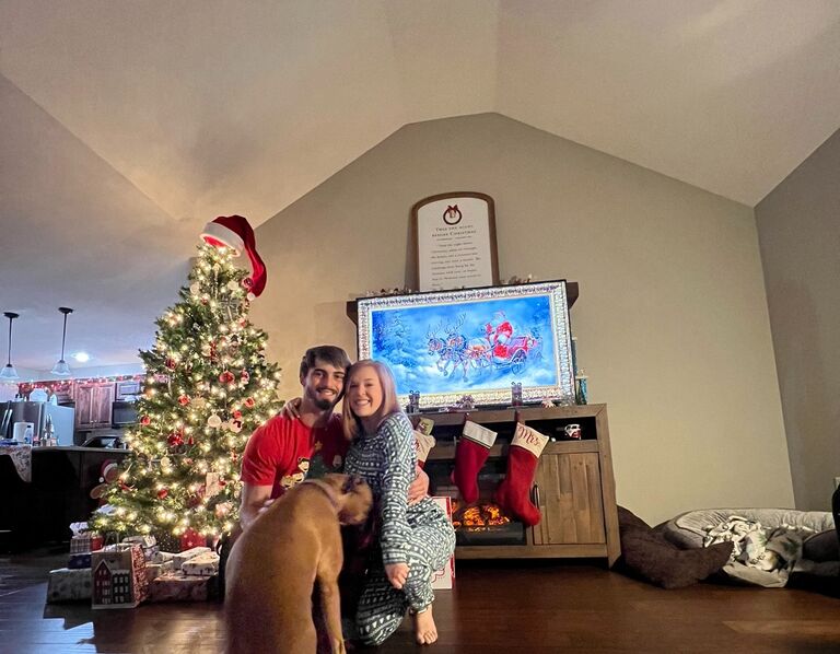 Bailey and Michael celebrating their first Christmas together. Featuring Gigi their Boxer. 