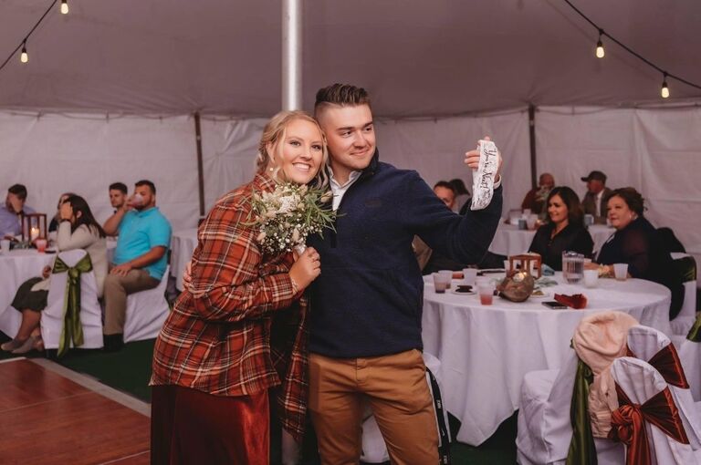 We went to our first wedding together and both caught the bouquet/garter! We knew it meant something... :)