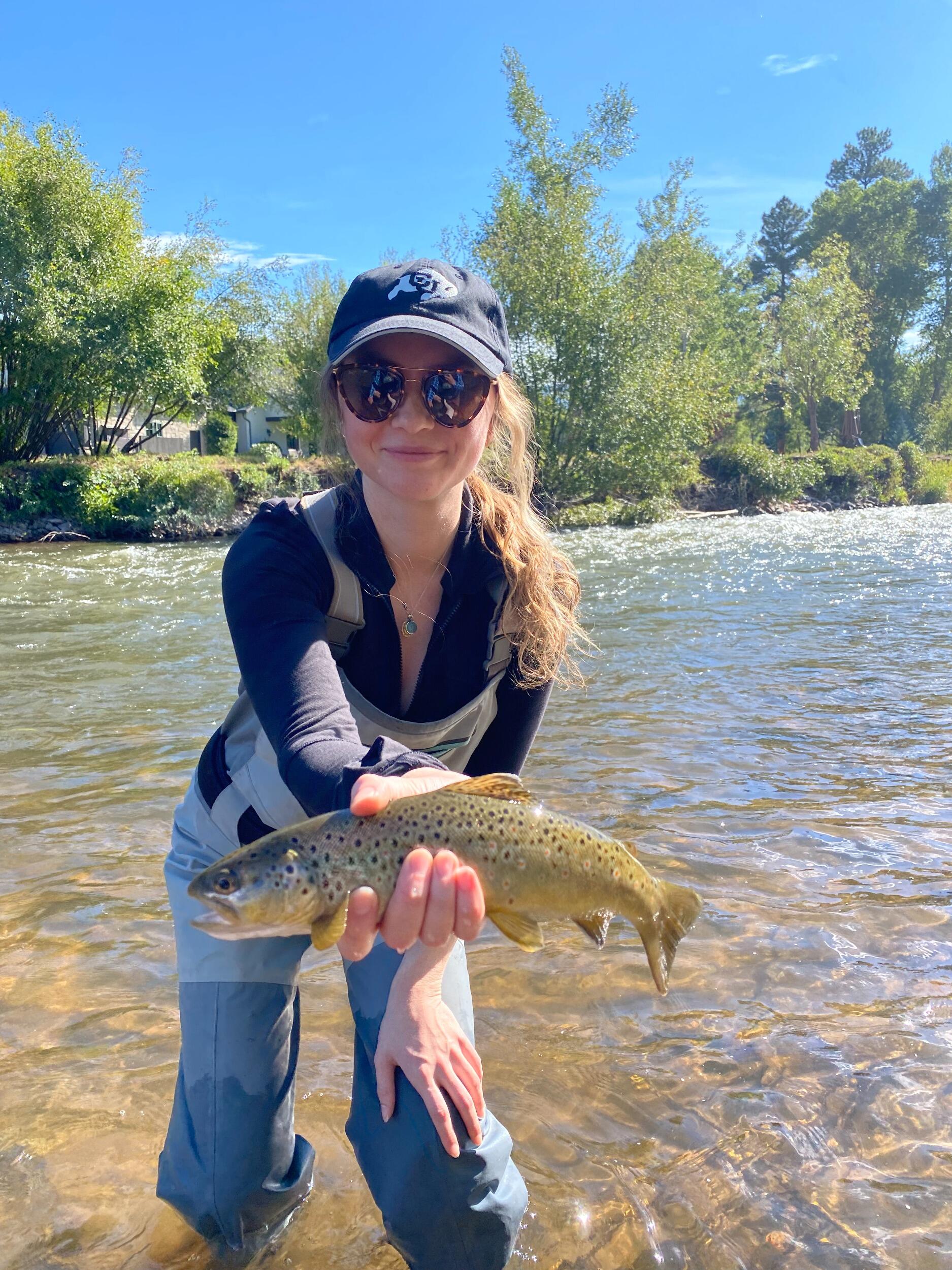 More fishing adventures! Samantha finally holds a fish. 