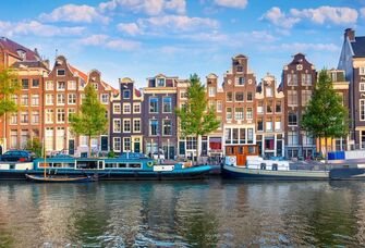 View of the colorful houses along the canal in Amsterdam