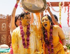 Couple having fun during traditional ceremony