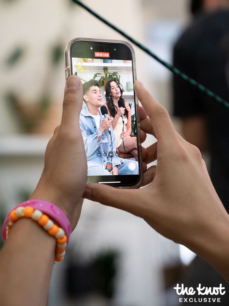 Alex Wassabi and Alexxis Lemire recording a music video