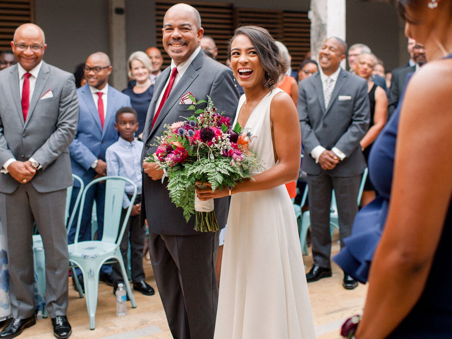 father walking bride down the aisle