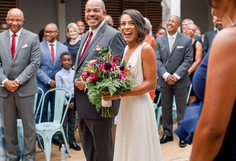 father walking bride down the aisle