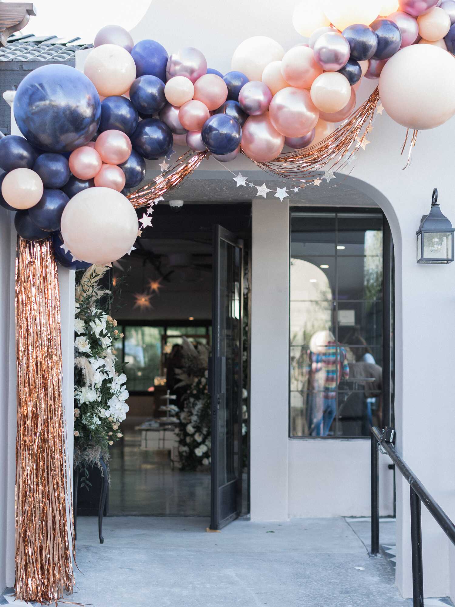 Purple and light pink metallic balloon garland with tinsel