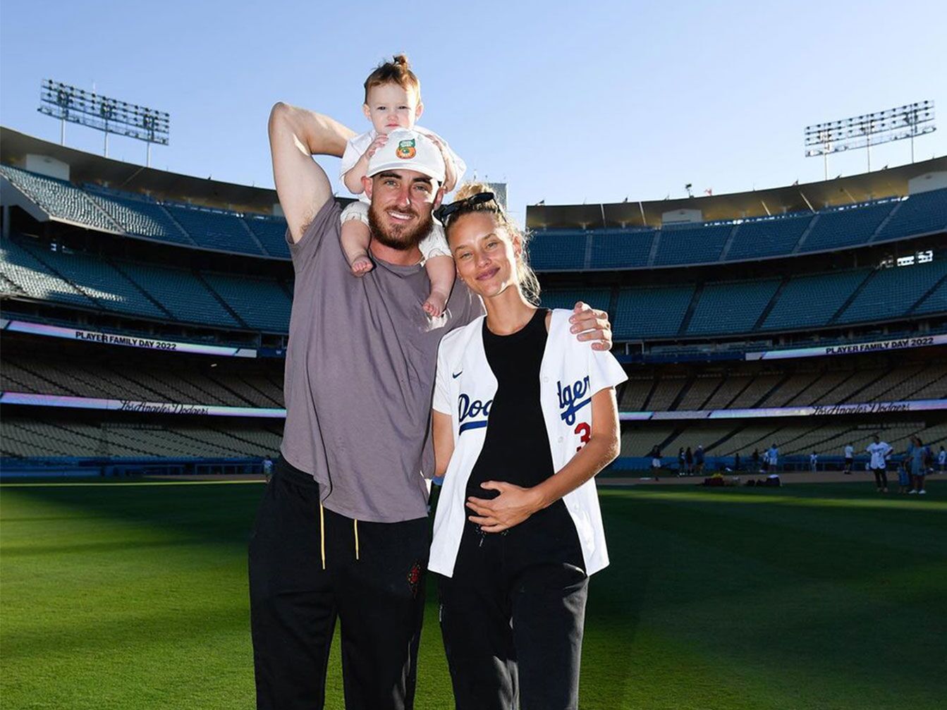 Cody Bellinger and Chase Carter with their baby