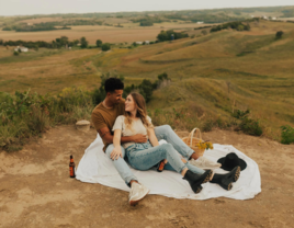 Couple having outdoor picnic in Nebraska, best places to propose in Nebraska