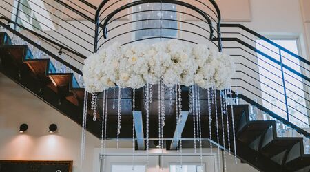 wire and flower mobiles/chandeliers in the Free People Store on Walnut  Street, Philadelphia, via fp blog