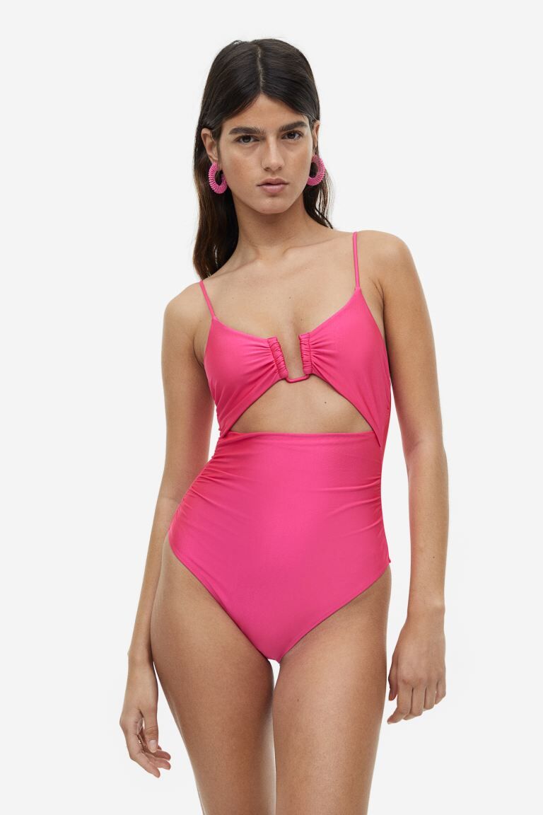 pink one piece with cutout