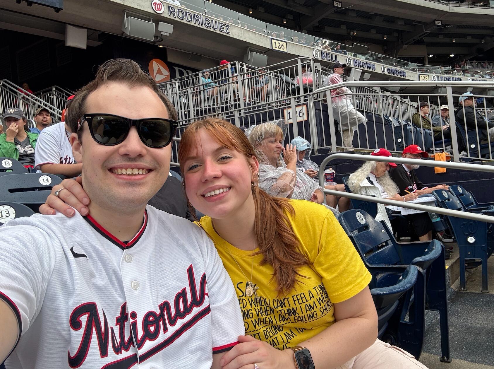 The couple goes to their first baseball game together, the weekend before their wedding.