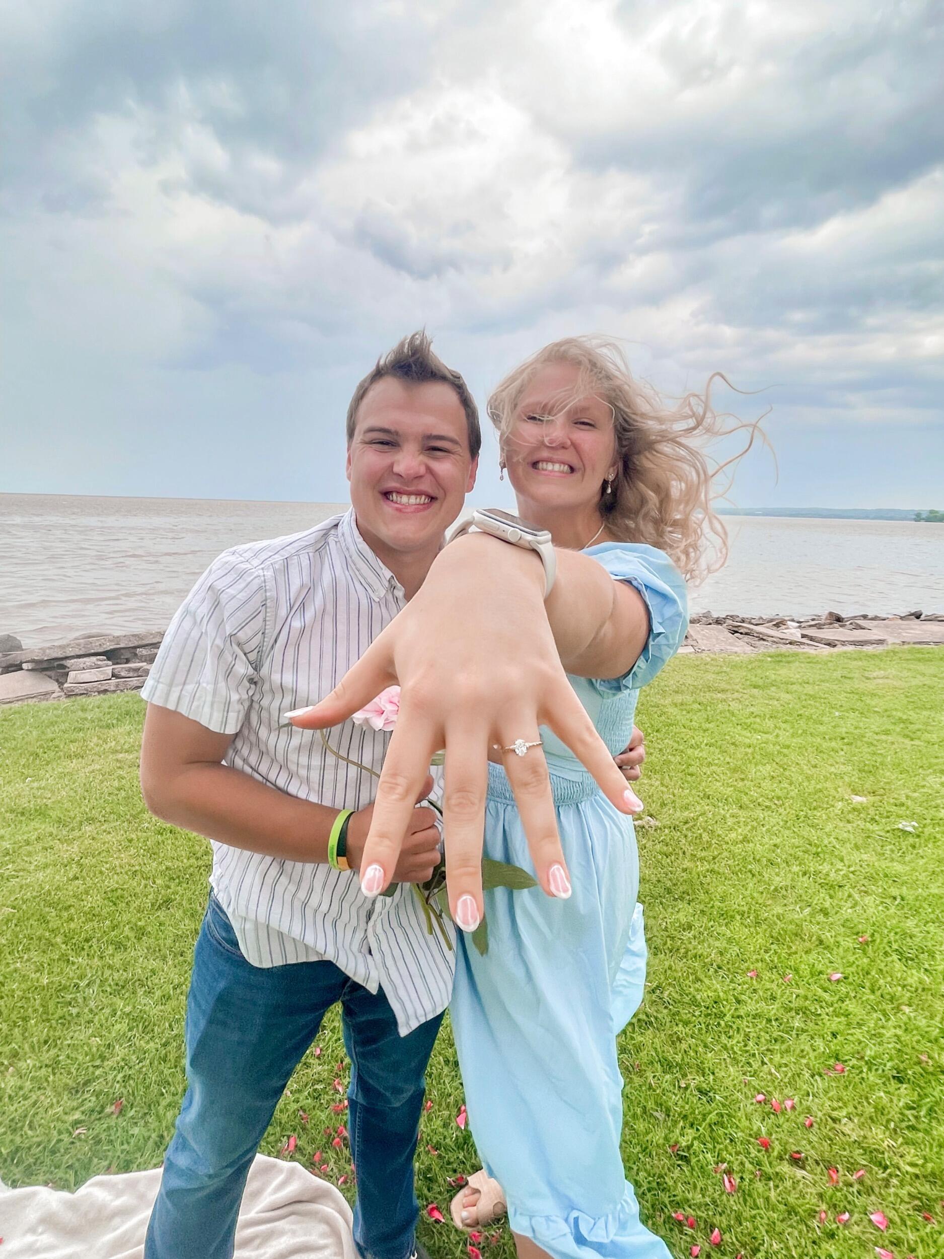 As a storm rolled in on an afternoon in May,  Kurtis asked Paige to marry him, with the help of Paige's best friends! She of course said "yes!" 
