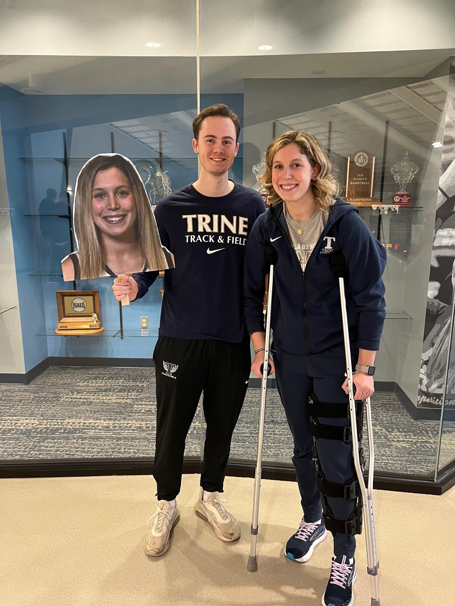 Eirik supports Sam on her senior night despite being on crutches because of her knee surgery. 