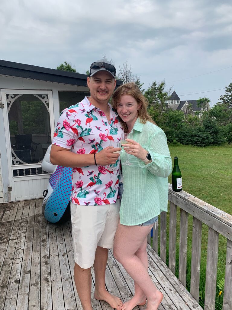 Celebrating after our engagement on the beach in P.E.I.