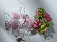 Broken vase with flowers