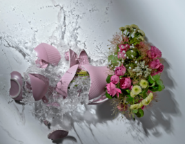 Broken vase with flowers