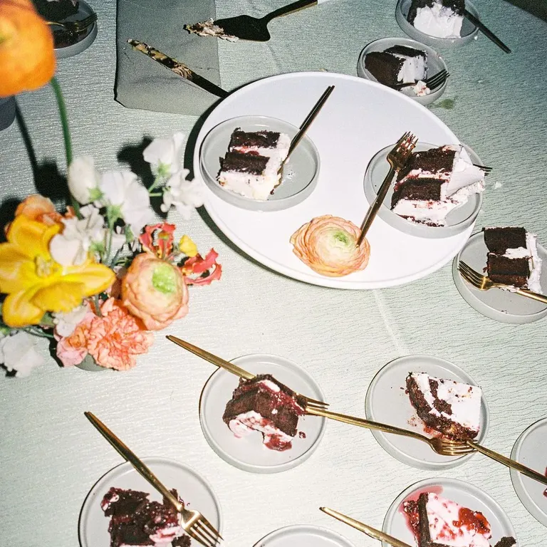 Red velvet wedding cake slices, taylor swift themed wedding