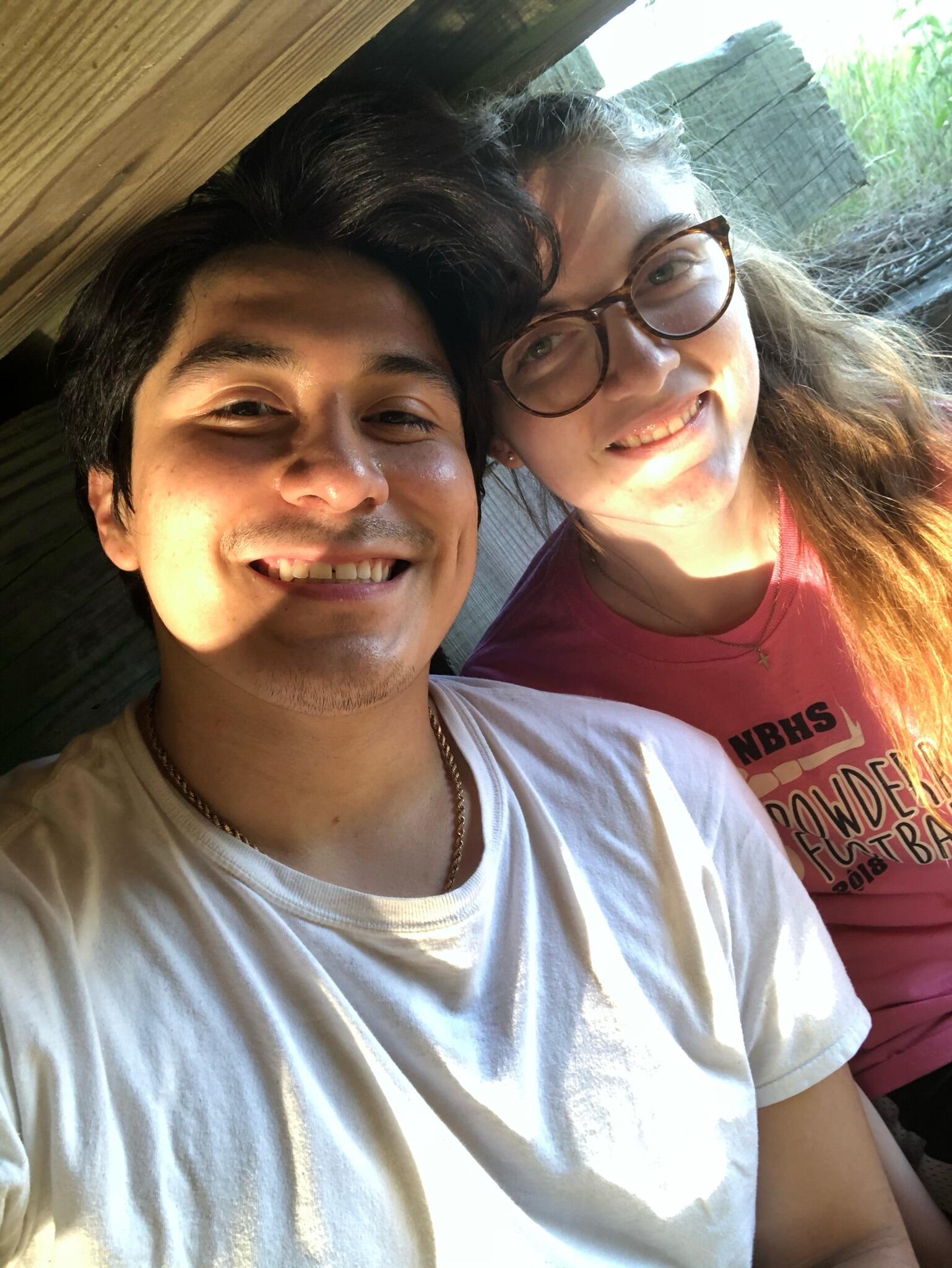 Octavio and Rachel became a couple. After airing up a tire and going for a long bike ride on the trail Octavio and Rachel decided to make their relationship official. This picture was taken under a bridge on the trail.