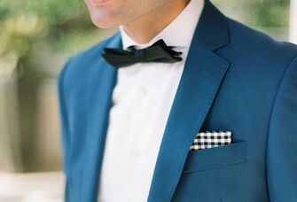 Menswear suit with bowtie and pocket square