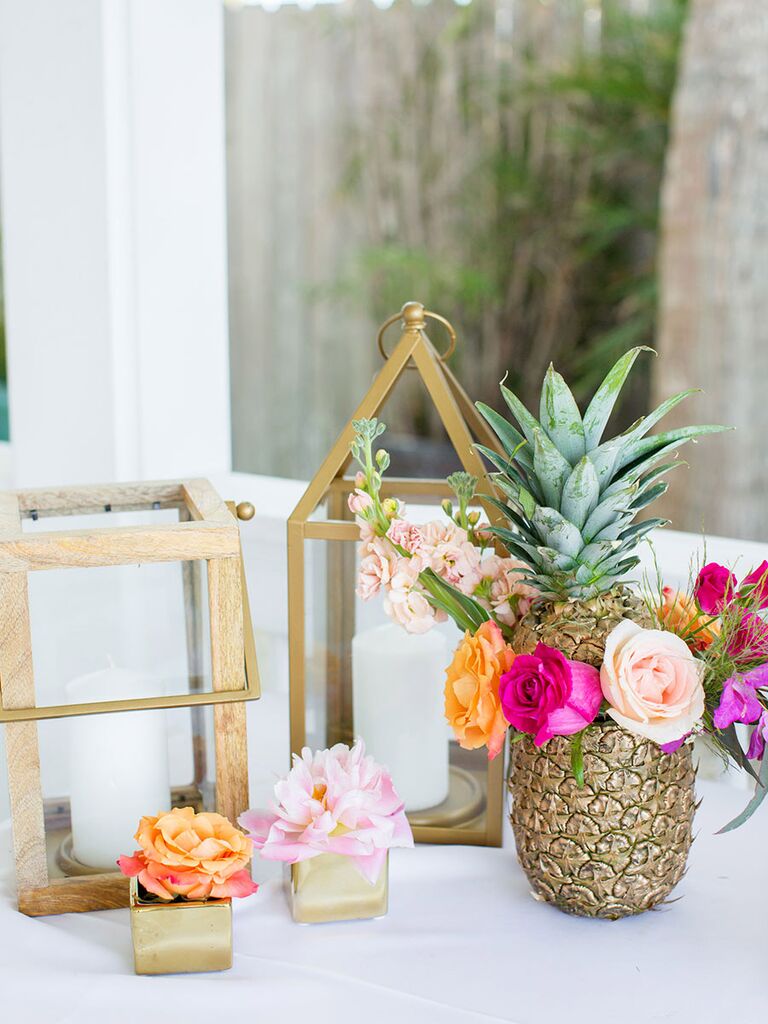 Tropical pineapple centerpiece with flowers